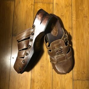 Nomi brown wood strappy leather clogs with studded details